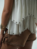Blusa con tachuelas 