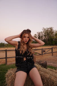 Blusa con tachuelas 