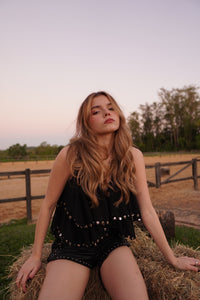 Blusa con tachuelas 
