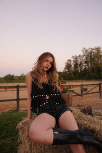 Blusa con tachuelas 
