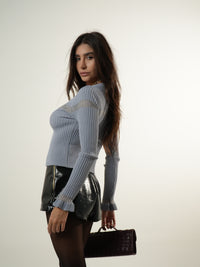 Blusa de punto con cintura