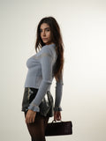 Blusa de punto con cintura